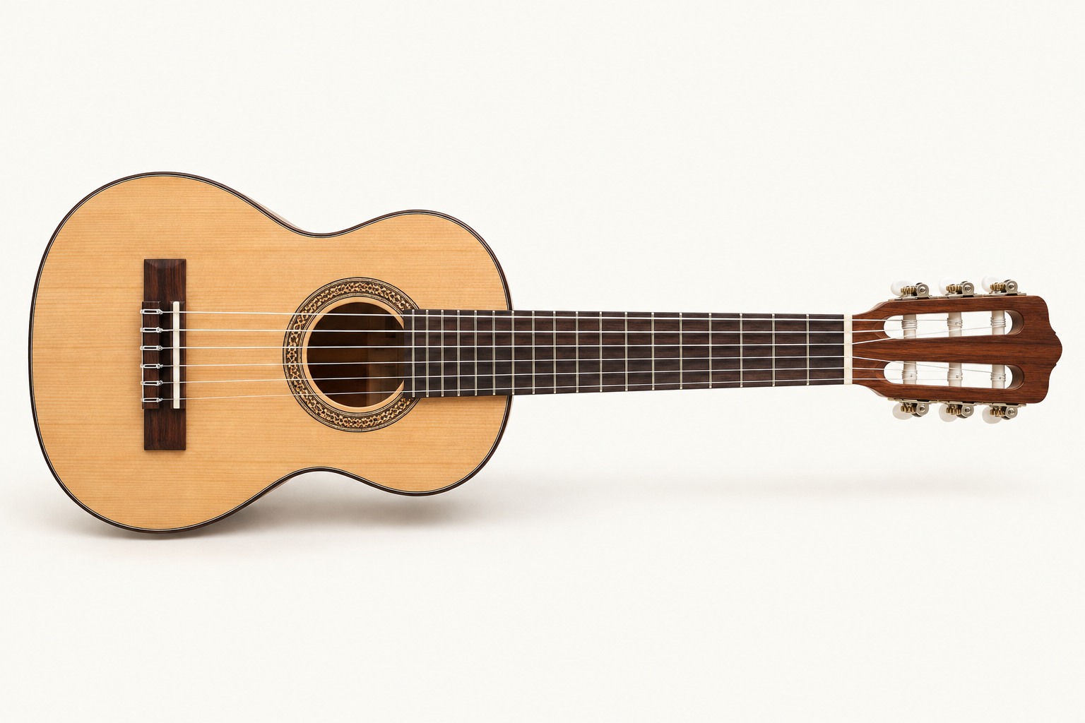 Illustration of a natural-finish six-string guitalele, shown horizontally